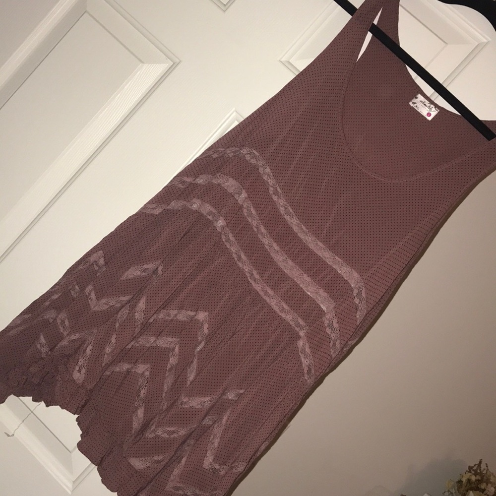 Free People flowy tank. Cute ruffle and lace edge